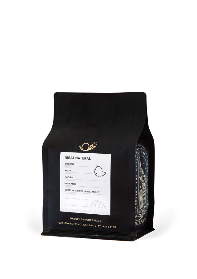 Ethiopia Nigat Natural coffee bag with white label showing origin details and tasting notes against black packaging